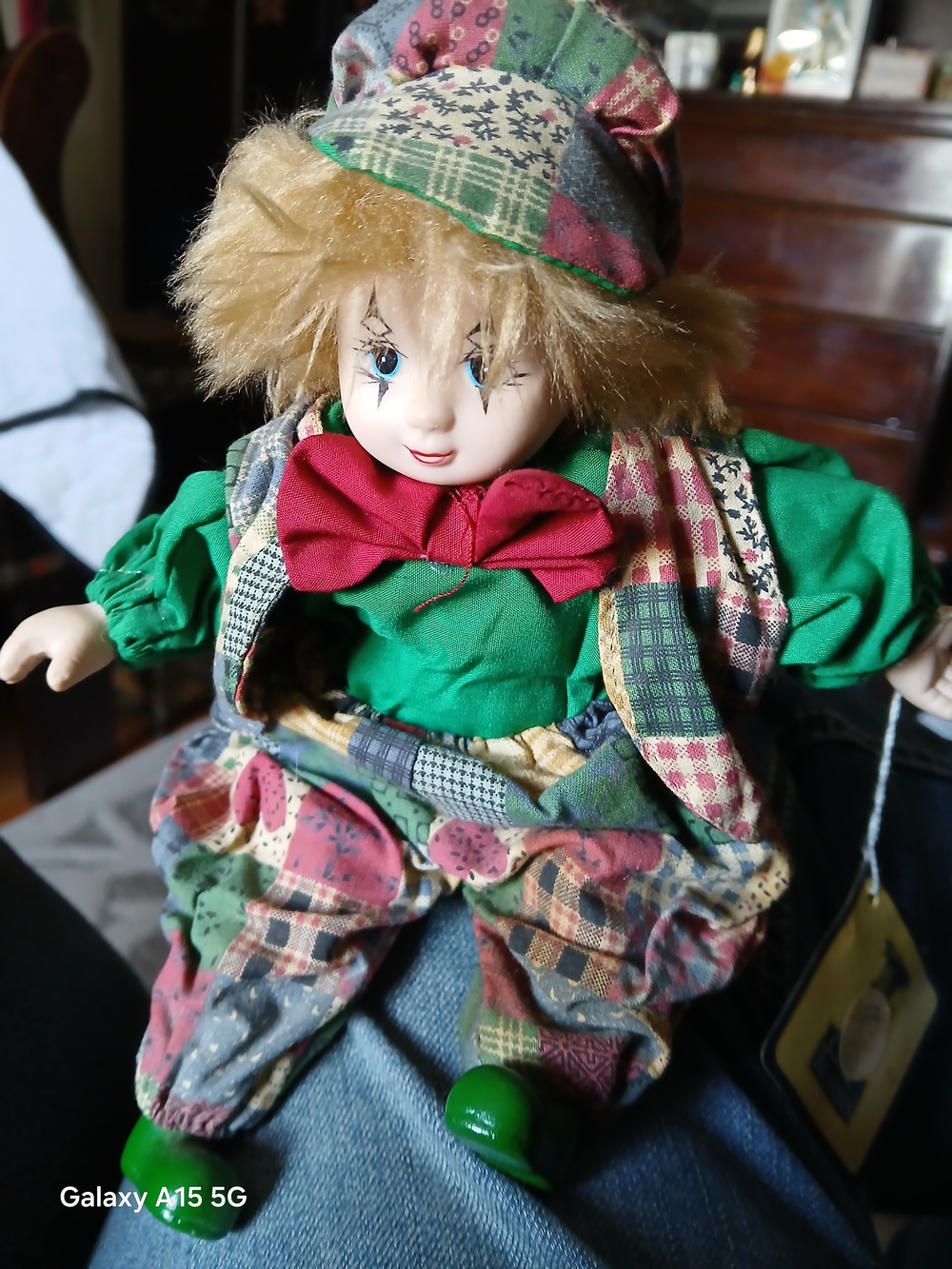 Patchwork Clown Doll with Green Outfit and Red Bow Tie